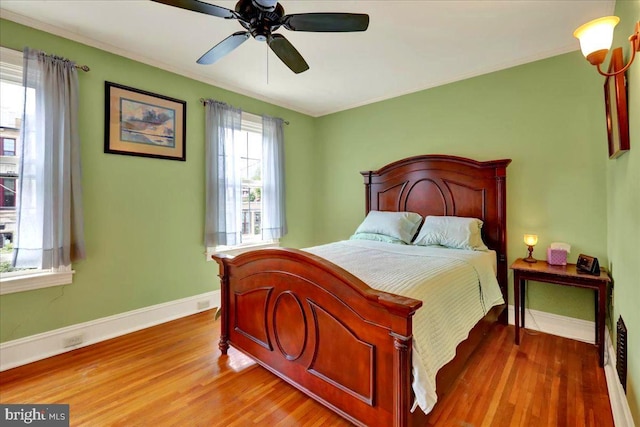 315 Nevin St, Lancaster, PA 17603 - bedroom featuring ornamental molding, wood finished floors, baseboards, and ceiling fan