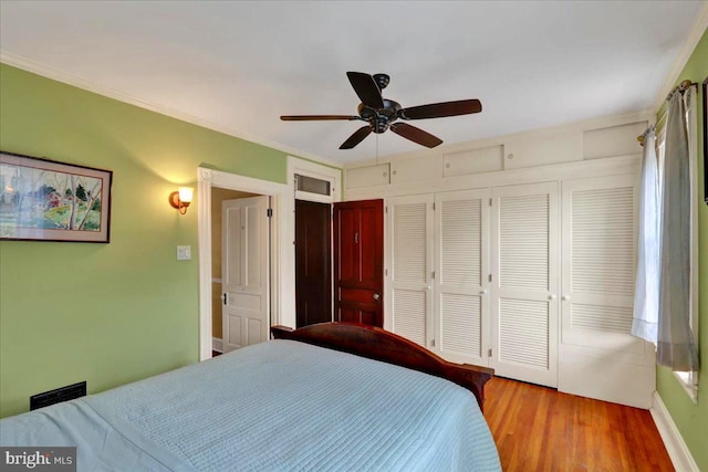 315 Nevin St, Lancaster, PA 17603 - bedroom featuring a closet, wood finished floors, a ceiling fan, and ornamental molding