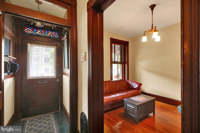 315 Nevin St, Lancaster, PA 17603 - foyer featuring baseboards and dark wood-type flooring
