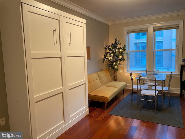 1121 24th St NW Unit 310, Washington, DC 20037 - living area with dark wood-type flooring, crown molding, and baseboards
