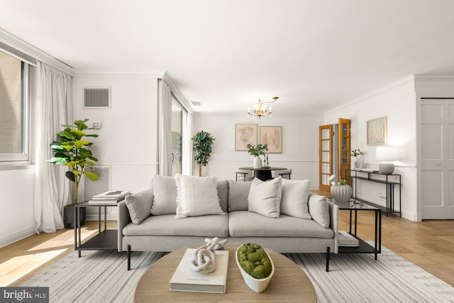 4601 N Park Ave N Unit 104-D, Chevy Chase, MD 20815 - living room with a chandelier, plenty of natural light, crown molding, and baseboards