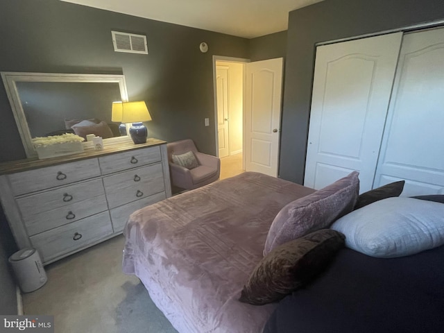 115 E Sheldrake Cir, Dover, DE 19904 - bedroom featuring a closet and light carpet