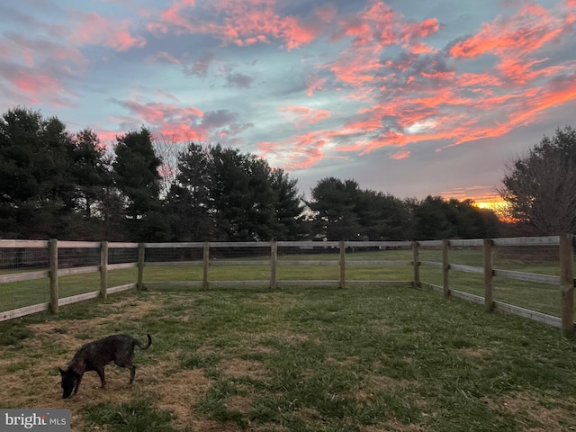 115 E Sheldrake Cir, Dover, DE 19904 - yard at dusk featuring a view of countryside