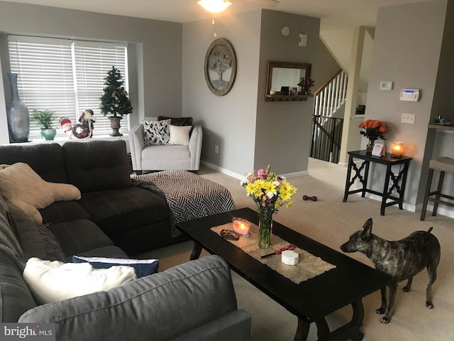 115 E Sheldrake Cir, Dover, DE 19904 - living area with carpet flooring, stairway, baseboards, and a ceiling fan