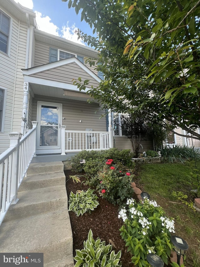 34 Argon Dr, Martinsburg, WV 25405 - entrance to property featuring a porch