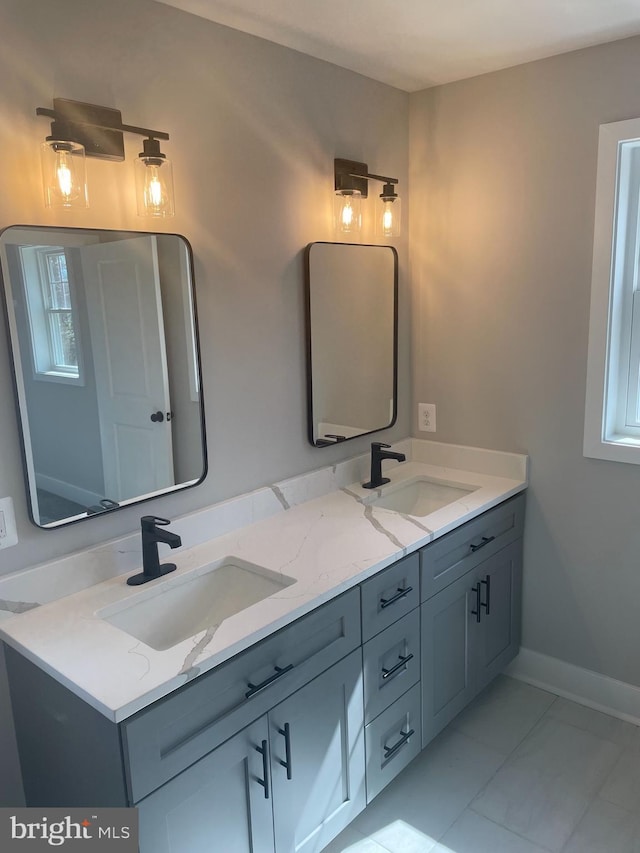 8917 Lennings Ln, Rosedale, MD 21237 - full bath featuring double vanity and baseboards