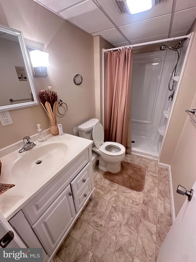 23 N Valley View Ln, Keyser, WV 26726 - bathroom with toilet, vanity, a shower stall, and a paneled ceiling
