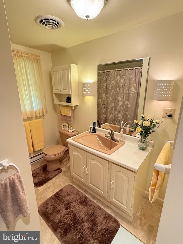 23 N Valley View Ln, Keyser, WV 26726 - full bath with a baseboard heating unit, toilet, vanity, tile patterned flooring, and curtained shower