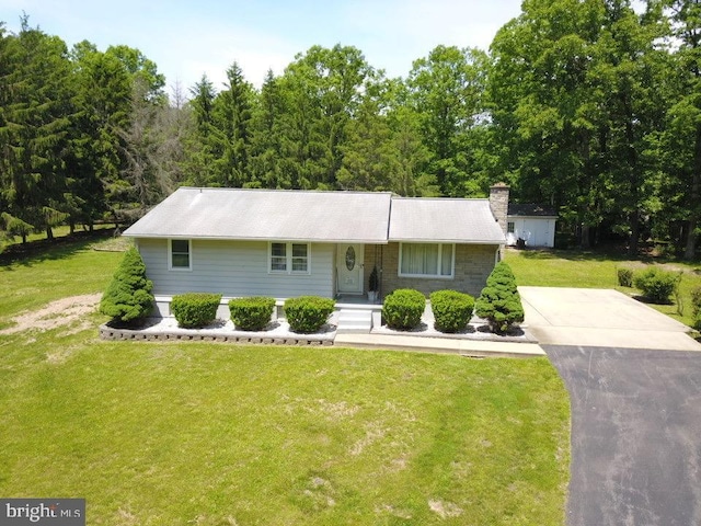 23 N Valley View Ln, Keyser, WV 26726 - view of front of house with a front yard and a chimney