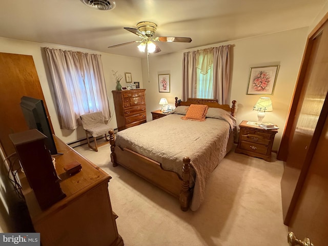 23 N Valley View Ln, Keyser, WV 26726 - bedroom with baseboard heating, light colored carpet, and a ceiling fan
