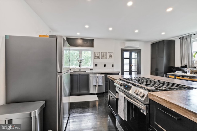 5319 Ames St NE, Washington, DC 20019 - kitchen featuring stainless steel appliances, plenty of natural light, dark cabinets, recessed lighting, and french doors