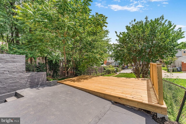 5319 Ames St NE, Washington, DC 20019 - wooden terrace featuring a fenced backyard and a patio