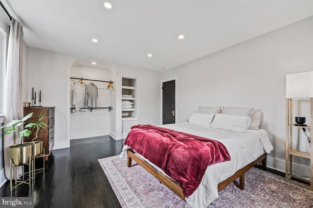 5319 Ames St NE, Washington, DC 20019 - bedroom featuring baseboards, recessed lighting, wood finished floors, and arched walkways