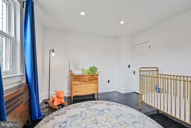 5319 Ames St NE, Washington, DC 20019 - bedroom with dark wood finished floors, recessed lighting, and baseboards