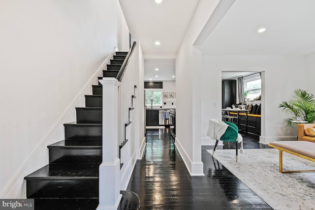 5319 Ames St NE, Washington, DC 20019 - stairway with plenty of natural light, hardwood / wood-style floors, baseboards, and recessed lighting