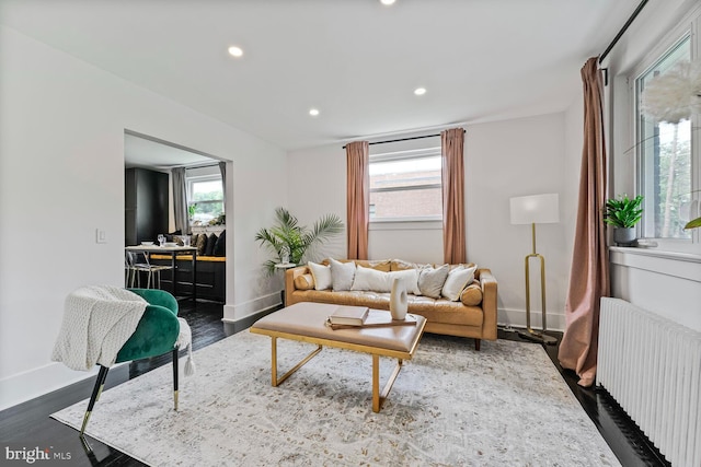 5319 Ames St NE, Washington, DC 20019 - living area featuring radiator heating unit, recessed lighting, baseboards, dark wood finished floors, and an office area