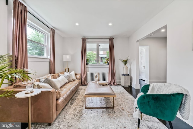 5319 Ames St NE, Washington, DC 20019 - living room with radiator, recessed lighting, wood finished floors, and baseboards