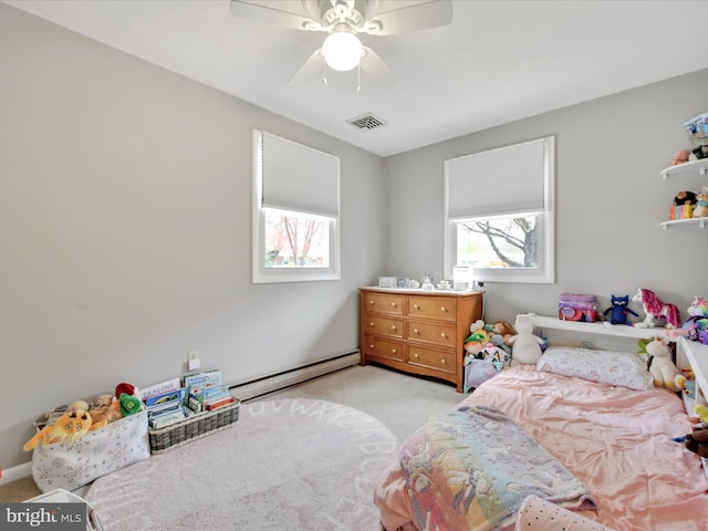 52 Circle Dr, Ephrata, PA 17522 - bedroom featuring a baseboard heating unit, light colored carpet, and a ceiling fan