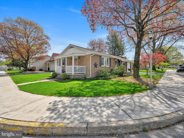 52 Circle Dr, Ephrata, PA 17522 - single story home with a porch, brick siding, and a front yard
