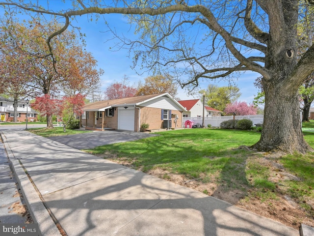 52 Circle Dr, Ephrata, PA 17522 - view of front of property with a garage, driveway, and brick siding