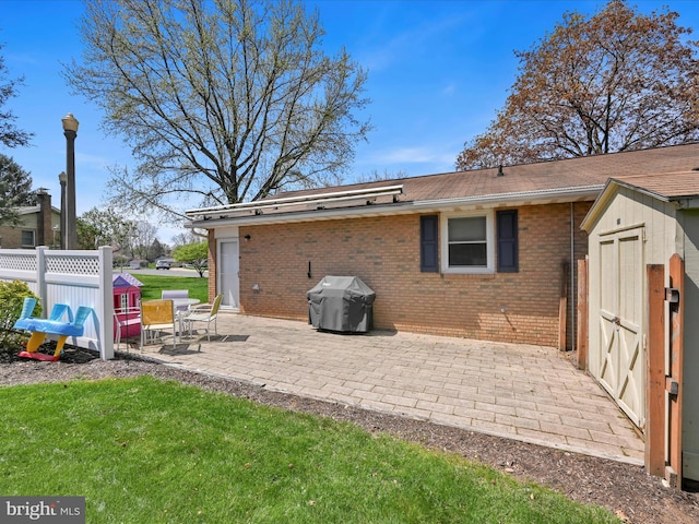 52 Circle Dr, Ephrata, PA 17522 - rear view of house featuring brick siding and a patio area