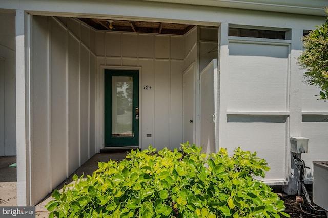 38395 Cardinal Ln Unit 184, Selbyville, DE 19975 - doorway to property featuring board and batten siding