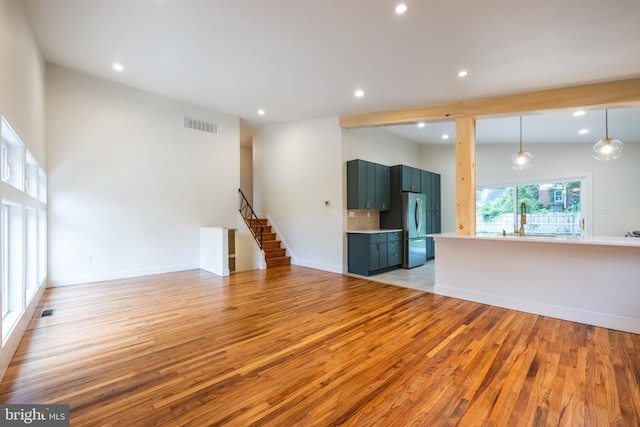 1674 Lafayette Way, Blue Bell, PA 19422 - unfurnished living room featuring light wood finished floors, recessed lighting, and stairs