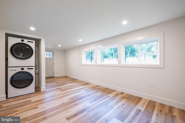1674 Lafayette Way, Blue Bell, PA 19422 - laundry room with stacked washer / dryer, light wood finished floors, and recessed lighting