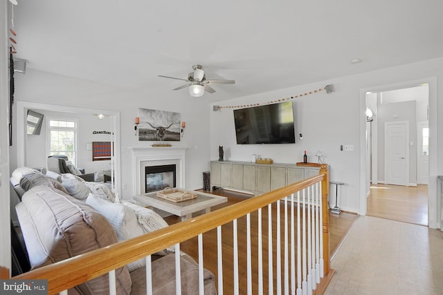 5040 Hummingbird Ln, Warrenton, VA 20187 - living room with a ceiling fan, a glass covered fireplace, and baseboards