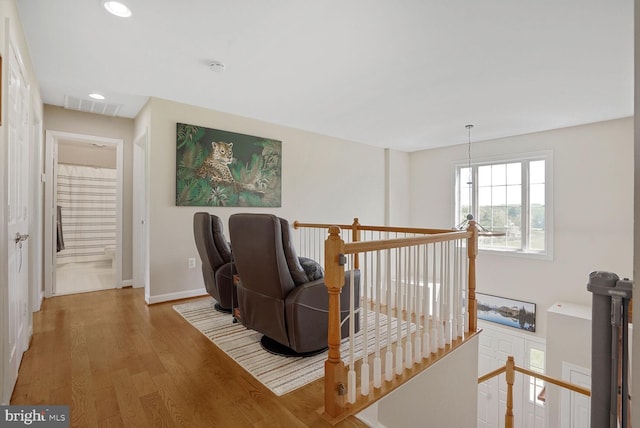 5040 Hummingbird Ln, Warrenton, VA 20187 - hall featuring an upstairs landing, wood finished floors, recessed lighting, and baseboards