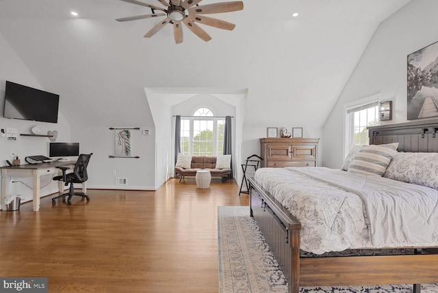5040 Hummingbird Ln, Warrenton, VA 20187 - bedroom with lofted ceiling, multiple windows, wood finished floors, an office area, and baseboards