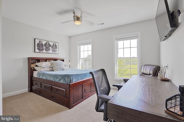 5040 Hummingbird Ln, Warrenton, VA 20187 - carpeted bedroom with baseboards, a ceiling fan, and a desk