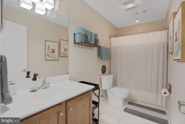 5040 Hummingbird Ln, Warrenton, VA 20187 - bathroom with toilet, vanity, tile patterned flooring, and curtained shower