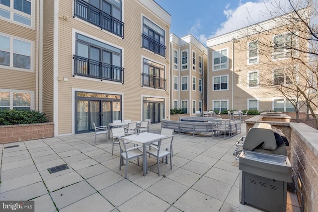 989 S Buchanan St Unit 409, Arlington, VA 22204 - view of patio featuring outdoor dining space