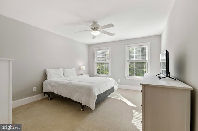 11 Woods Edge Rd, West Chester, PA 19382 - bedroom with baseboards, light colored carpet, and a ceiling fan