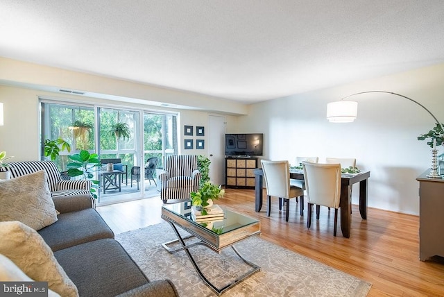 1600 N Oak St Unit 324, Arlington, VA 22209 - living room with wood finished floors