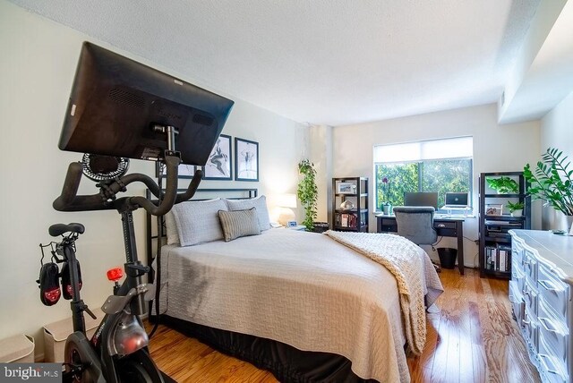 1600 N Oak St Unit 324, Arlington, VA 22209 - bedroom featuring wood finished floors
