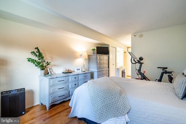 1600 N Oak St Unit 324, Arlington, VA 22209 - bedroom with light wood-type flooring and baseboards