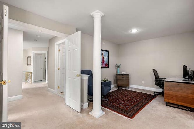carpeted office featuring decorative columns, baseboards, and recessed lighting