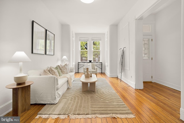 704 F St NE, Washington, DC 20002 - living area with light wood-type flooring and baseboards