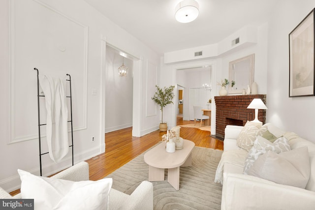704 F St NE, Washington, DC 20002 - living area featuring wood finished floors and baseboards