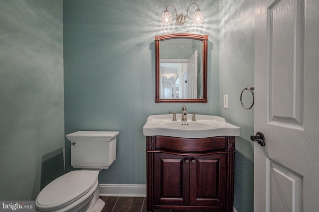 143 Bakerfield Dr, Middletown, DE 19709 - half bath featuring toilet, baseboards, vanity, tile patterned floors, and a chandelier