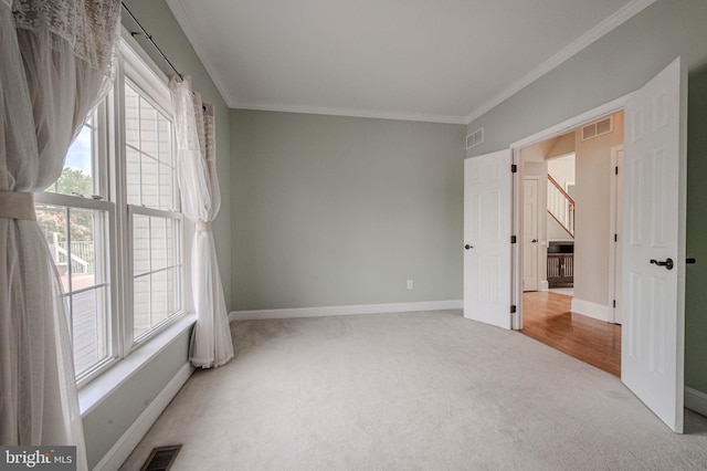 143 Bakerfield Dr, Middletown, DE 19709 - carpeted spare room featuring crown molding and baseboards