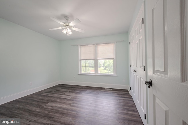143 Bakerfield Dr, Middletown, DE 19709 - unfurnished room with baseboards, ceiling fan, and dark wood-style floors