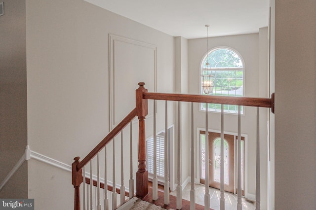 143 Bakerfield Dr, Middletown, DE 19709 - stairway featuring a chandelier