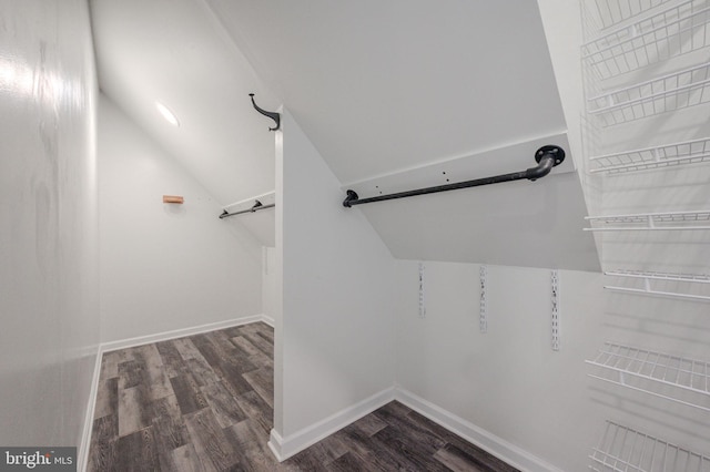 143 Bakerfield Dr, Middletown, DE 19709 - walk in closet featuring wood finished floors and vaulted ceiling