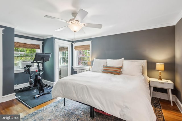 330 Wood Ln, Haddonfield, NJ 08033 - bedroom with wood finished floors, baseboards, crown molding, and ceiling fan