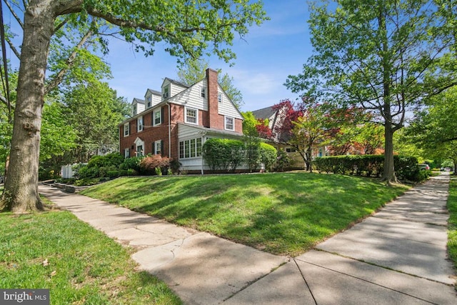 330 Wood Ln, Haddonfield, NJ 08033 - view of home's exterior featuring brick siding, a chimney, and a yard