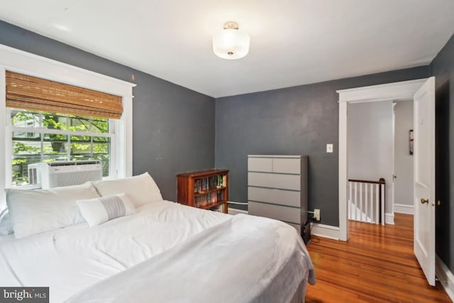 330 Wood Ln, Haddonfield, NJ 08033 - bedroom featuring wood finished floors, cooling unit, and baseboards