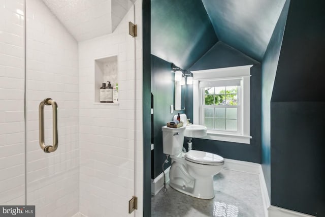 330 Wood Ln, Haddonfield, NJ 08033 - bathroom featuring lofted ceiling, a stall shower, toilet, and baseboards